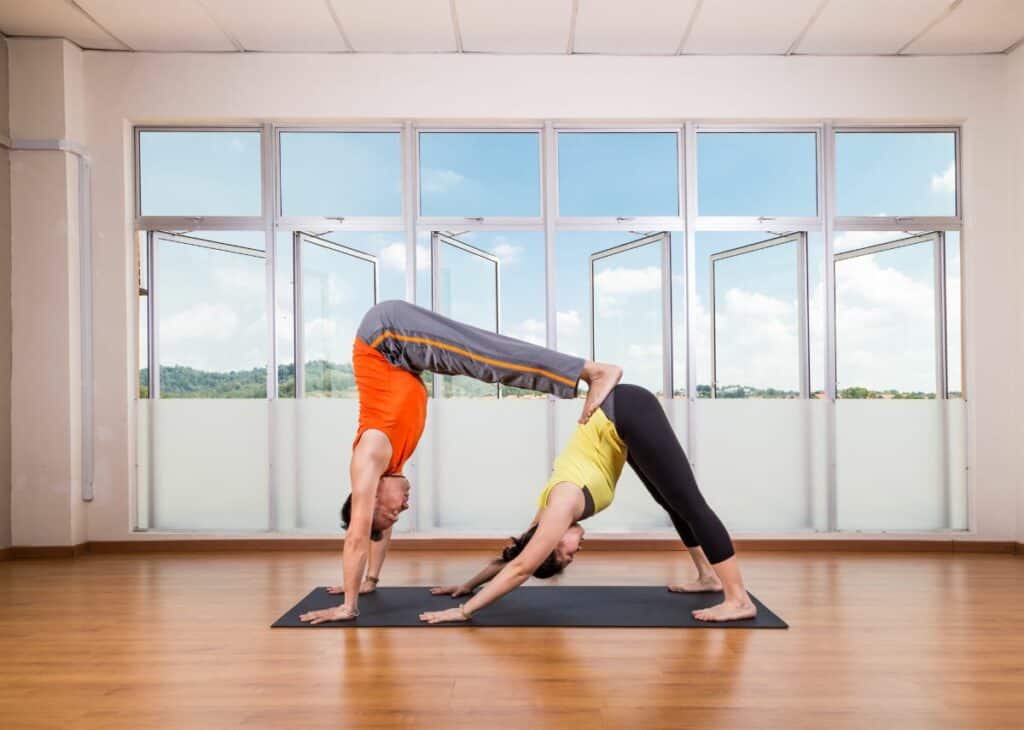 Double Downward Dog - Uniting Body and Soul: The Joys and Benefits of Couples Yoga